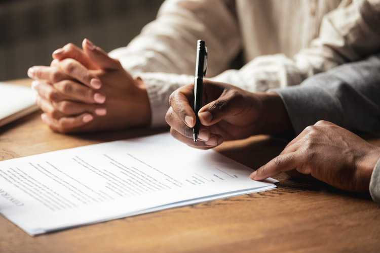 Kina Bank business customers signing a contract